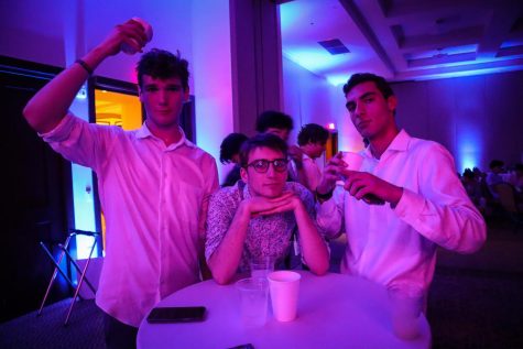 Henry Sutro, Kaden Brastow, and Will Statz are exhausted towards the end of Winter Formal, and take a break from dancing.