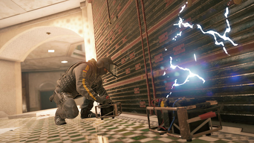 A player places shock traps on reinforced walls in preparation for an enemy attack.