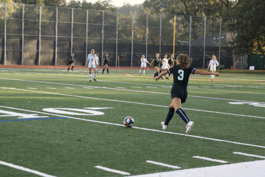 Senior midfielder Maya Wells preparing to take the free kick, which ended up leading to the goal.