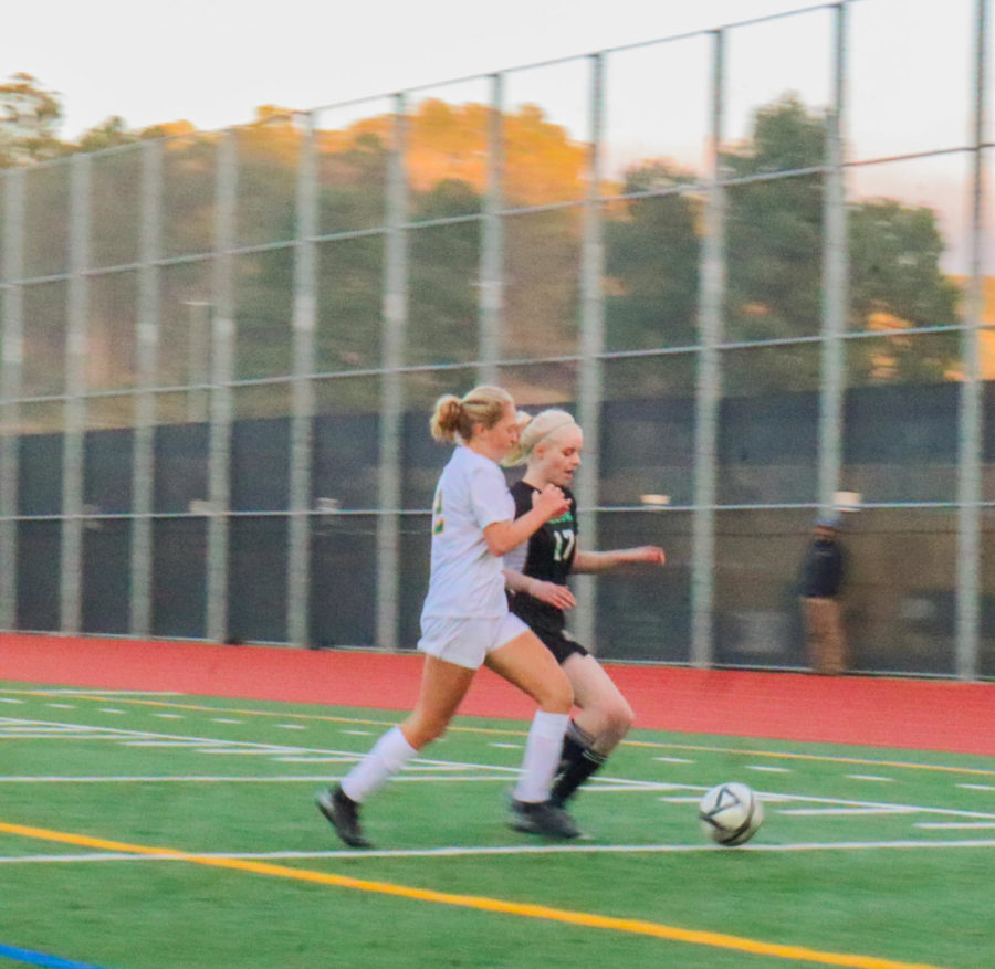 Sophomore Simone Pringle, #17, fights for the ball against San Marin’s player.