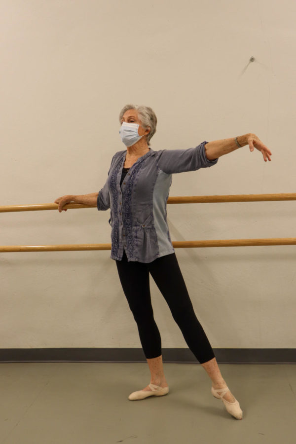 Ms. Stapleton demonstrates a tendu to her Monday ballet class.