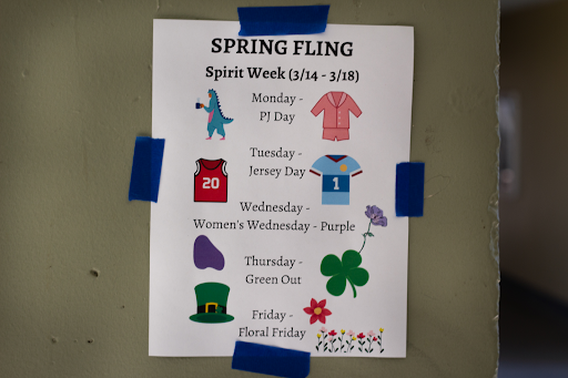A poster in the halls advertises the Spring Fling and different days of Spirit Week.
