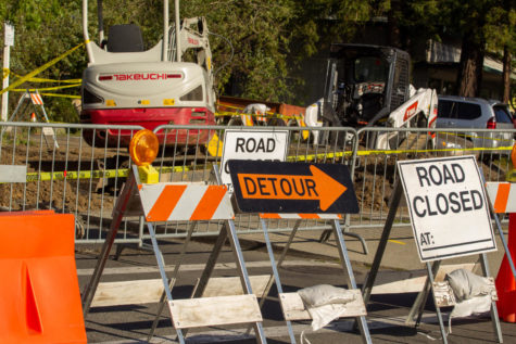 Construction signs redirect drivers away from the sinkhole on Center Boulevard towards Bridge Avenue in Downtown San Anselmo.