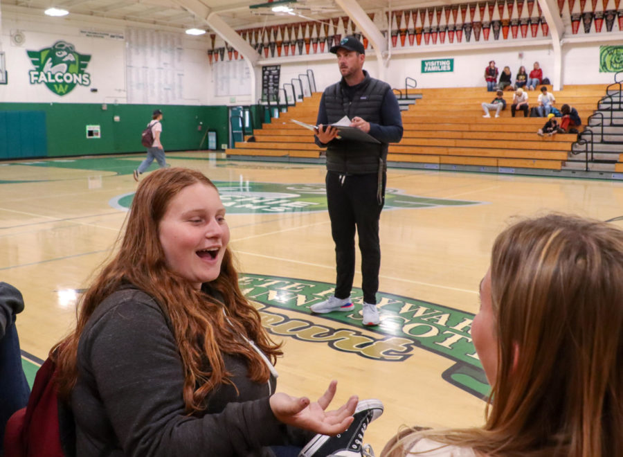 AWHS sophomore Sevi Solari talks with a fellow student during her P.E. class.