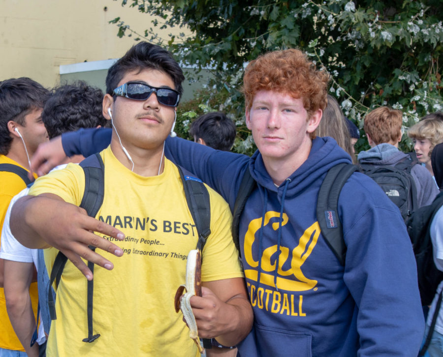 AWHS senior Angel Amador and Nate Karpay-Brody indulge in traditional Minion cuisine during Mondays spirit day. 