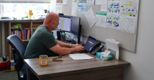 Student Dean of Success Alan Nealley works in his office on Friday, Sept. 16. 