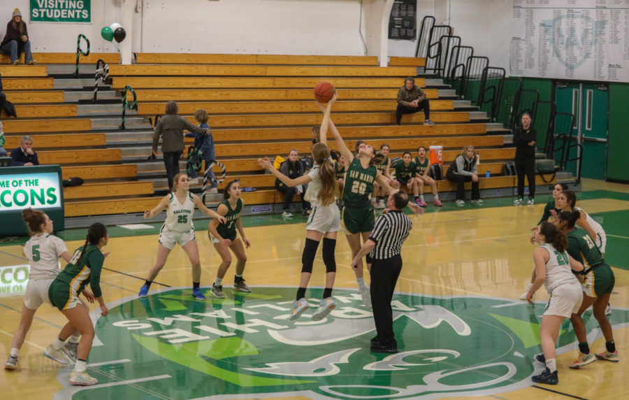 Sophomore guard Carly Amborn jumps up for the tip-off to start the game against San Marin High School on Thursday, Feb. 3.