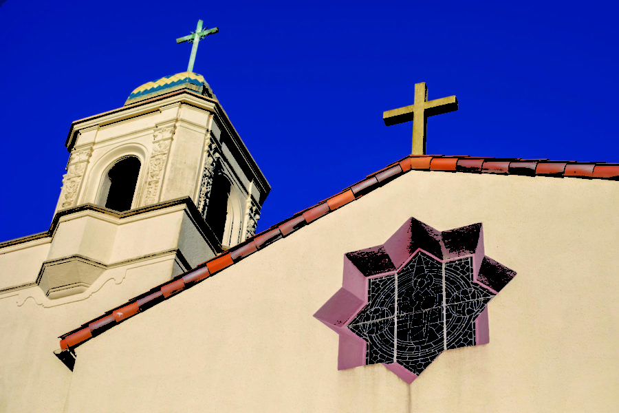 Across+from+the+Fairfax+library%2C+the+crosses+atop+the+Saint+Rita+Church+shine.