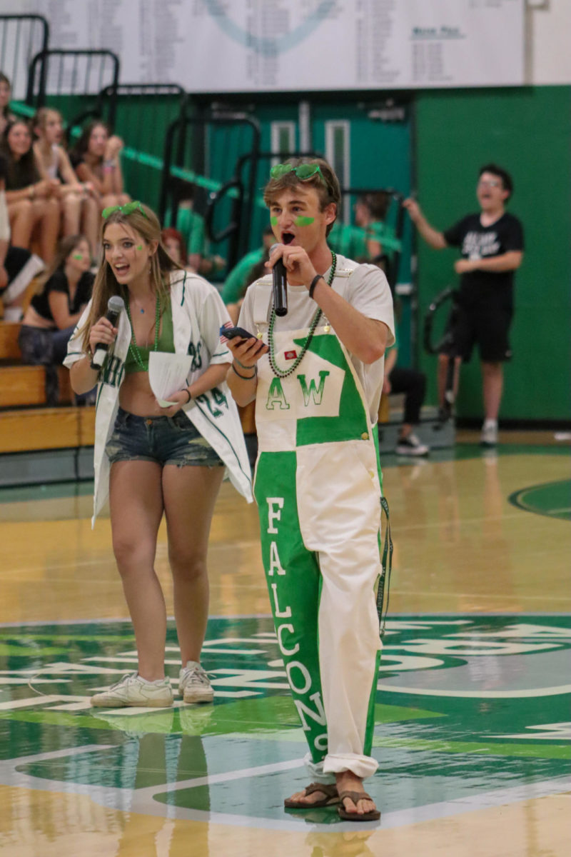 ASB president Charley ONeil and ASB vice president Max Lefferts lead the school in the falcon chant.