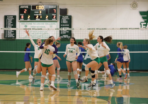 Archie Williams varsity volleyball celebrates after a successful rally.
