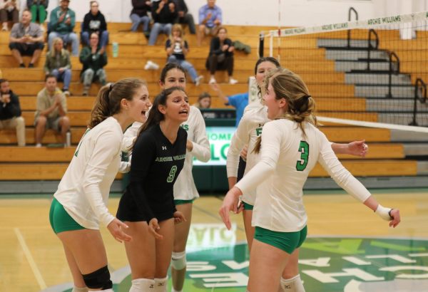 Archie Williams Varsity volleyball celebrate after a good play on Tuesday.