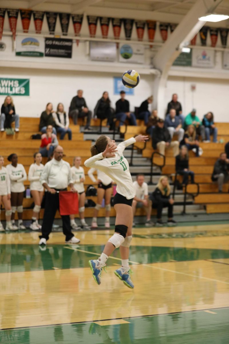Archie Williams senior Amelia Richer serves during the first quarter of their game on Friday. 