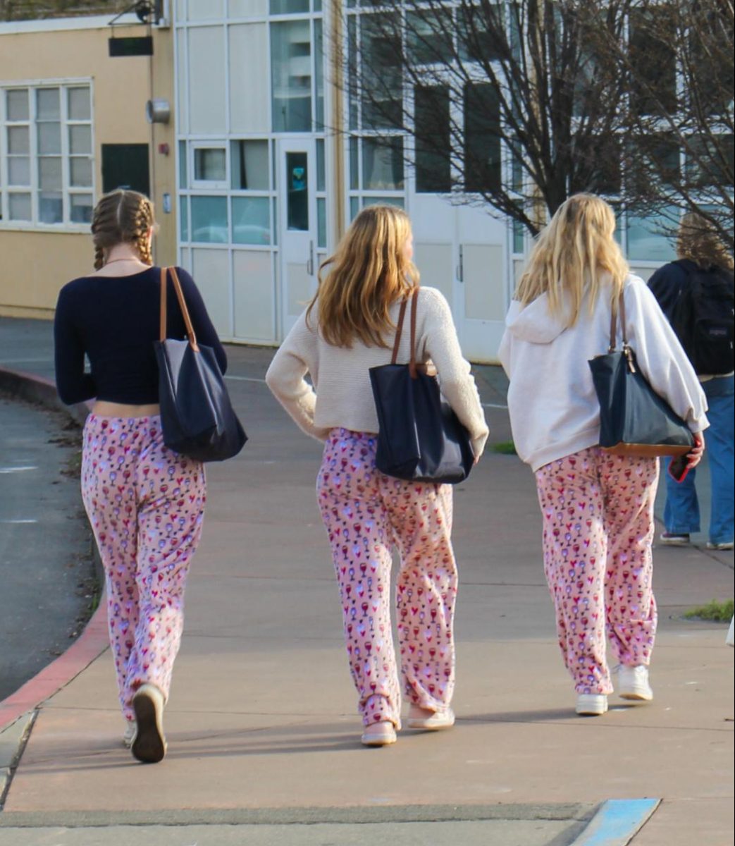 Three+Archie+Williams+students+wear+matching+PJs+on+the+first+day+of+Spirit+Week.