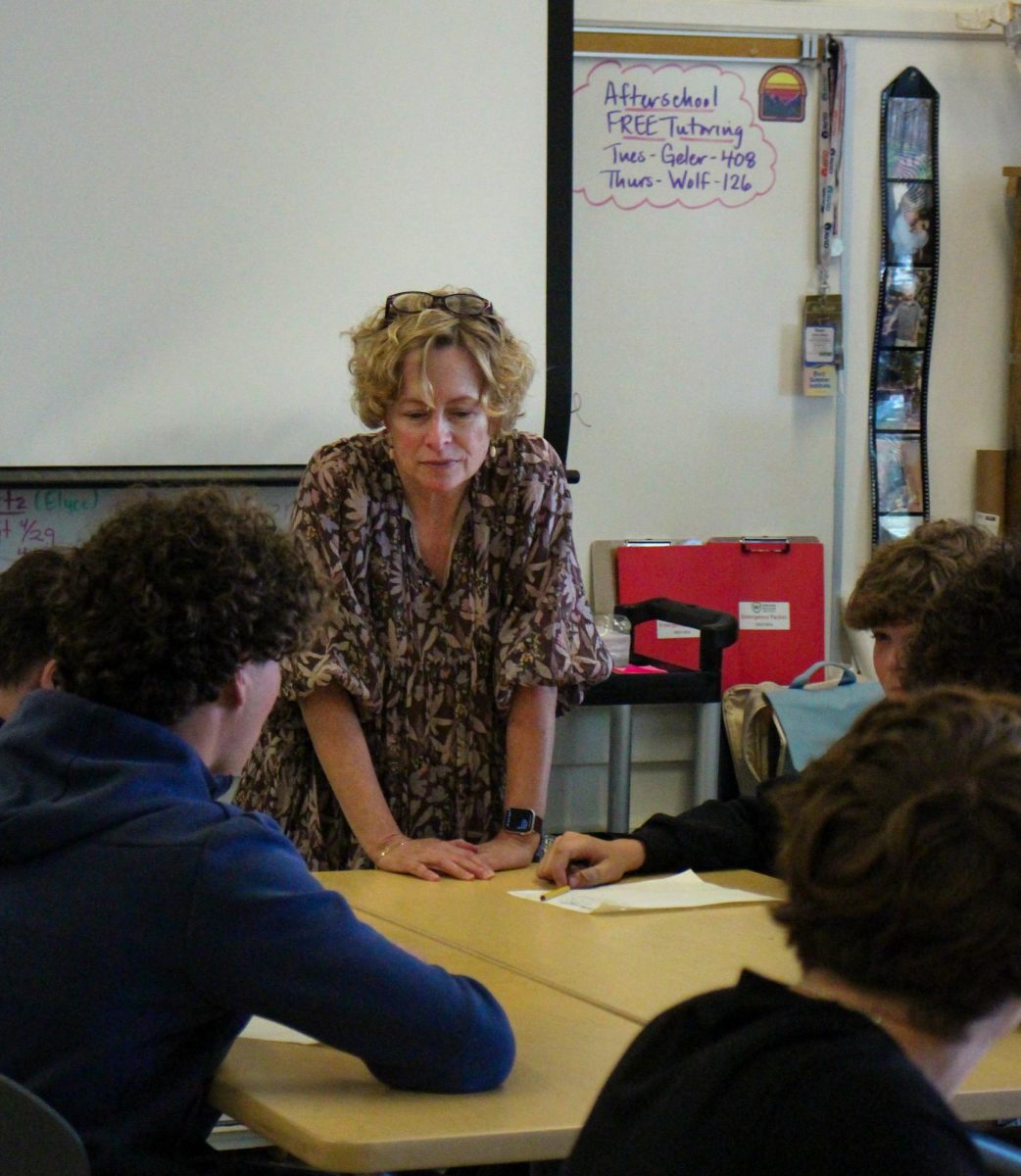 Community Consciousness teacher Raquel Nelson teaches to her fourth period class.