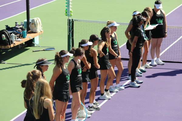 Archie Williams girls tennis prepares for their matches against Novato High School Thursday, Aug. 29.