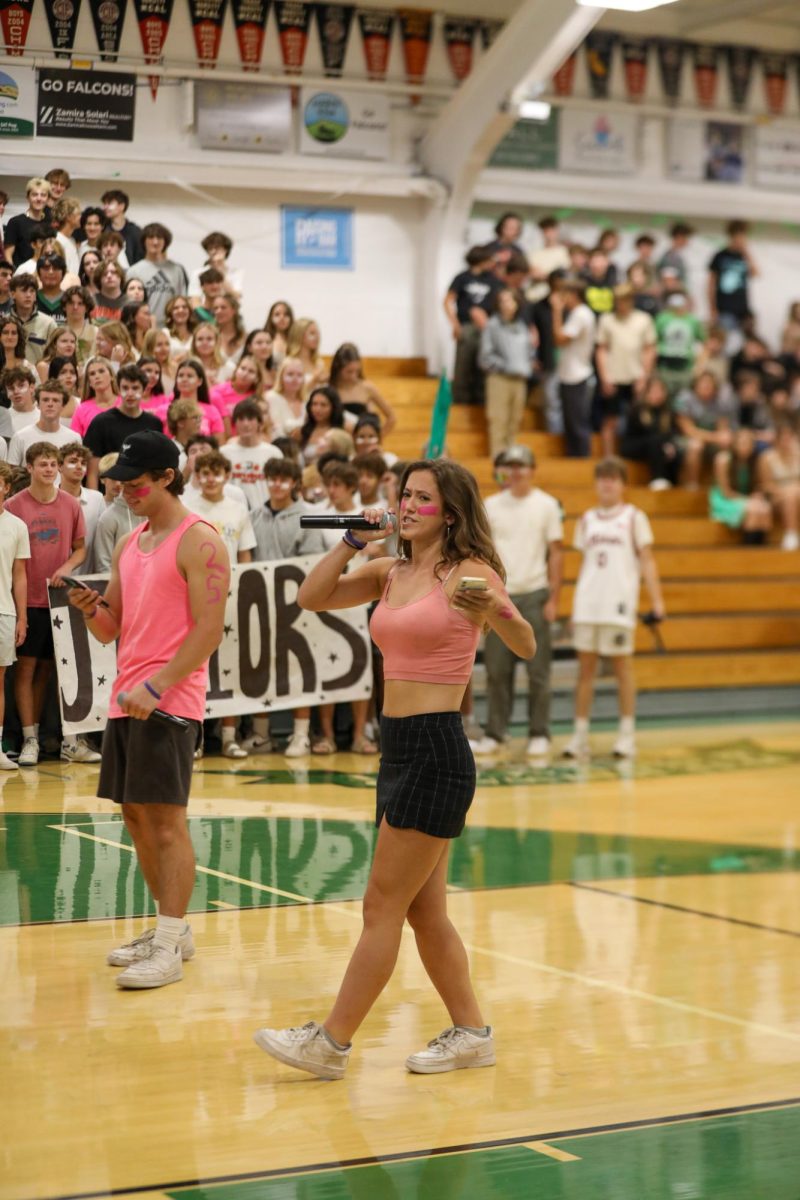 Senior ASB president Caroline Lozaw starts off the Homecoming Rally with an energetic entrance.