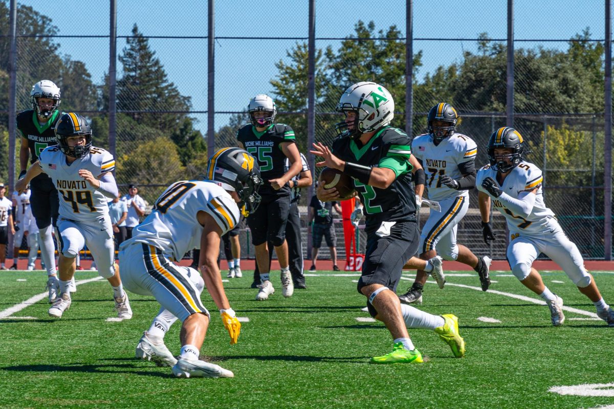 Archie Williams senior Lincoln Tithof attempts to run around a defender.