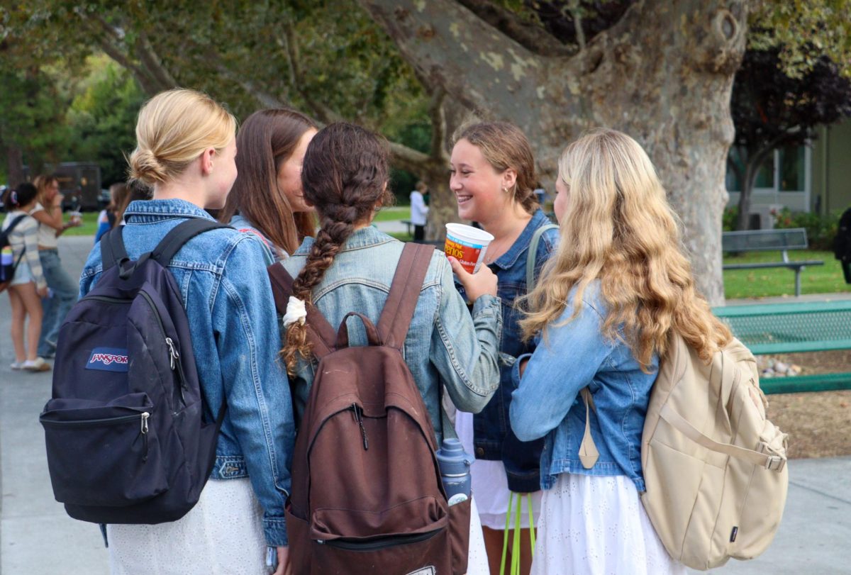 Group of girls dressed up in denim in honor of Disco vs Denim day.