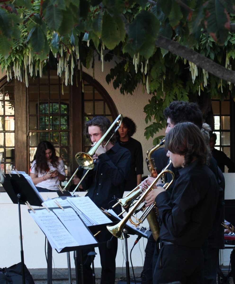 The Archie Williams Jazz Band brass section performs "Waves" by Antônio Carlos Jobim.