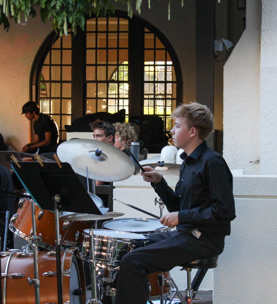 Archie Williams sophomore Alex Casey drums along to the beat of the song "Come On Come Over" by Jaco Pastorius.