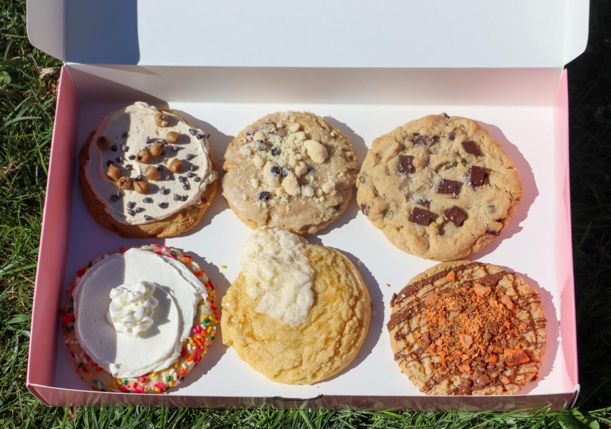 Crumbl's Oct. 14-19 National Flavors left to right: Cookie Dough, Blueberry Muffin, Classic Semi-Sweet Chocolate Chunk, Cornbread Cookie and Peanut Butter Crisp ft. Butterfinger®.