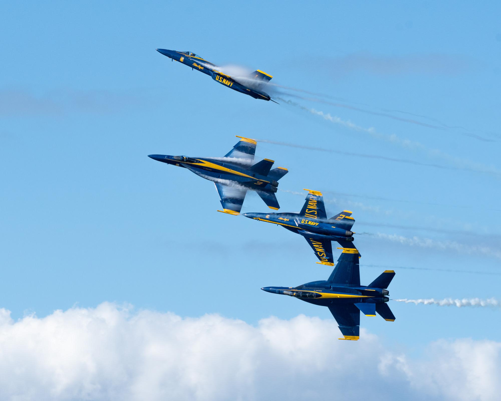 The Blue Angels diamond performs the barrel roll break during the 2024 Fleet Week Airshow. 