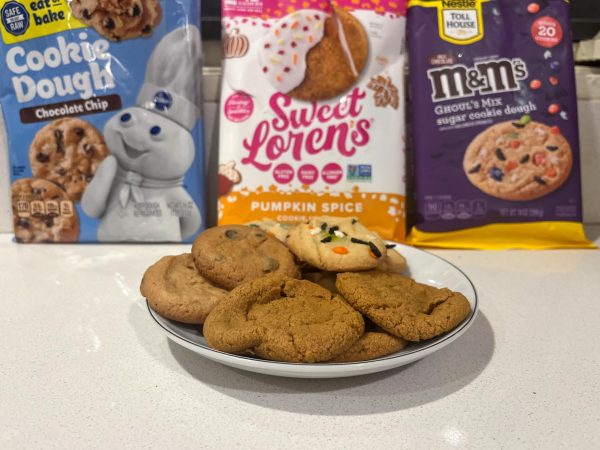 Pillsbury cookie boxes advertise the finished products shown in front of them.