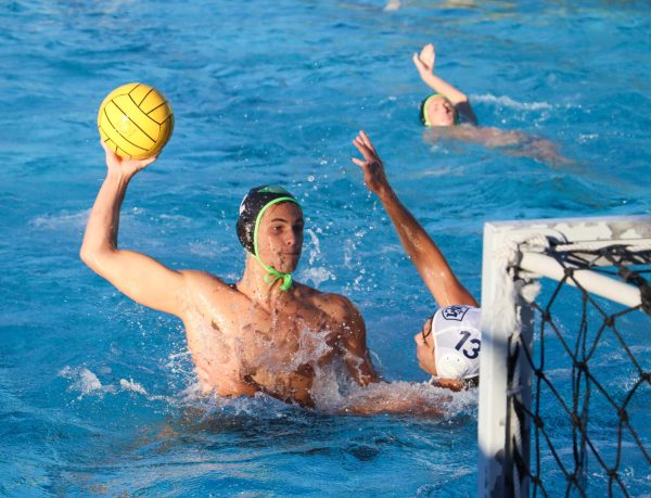 Senior Vincent Krilanovich takes a shot and scores in the Senior Night game against Marin Catholic.