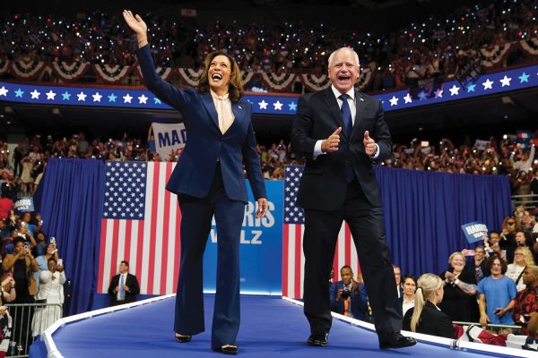 Kamala Harris and Tim Walz take the stage at the Democratic National Convention Aug. 22.