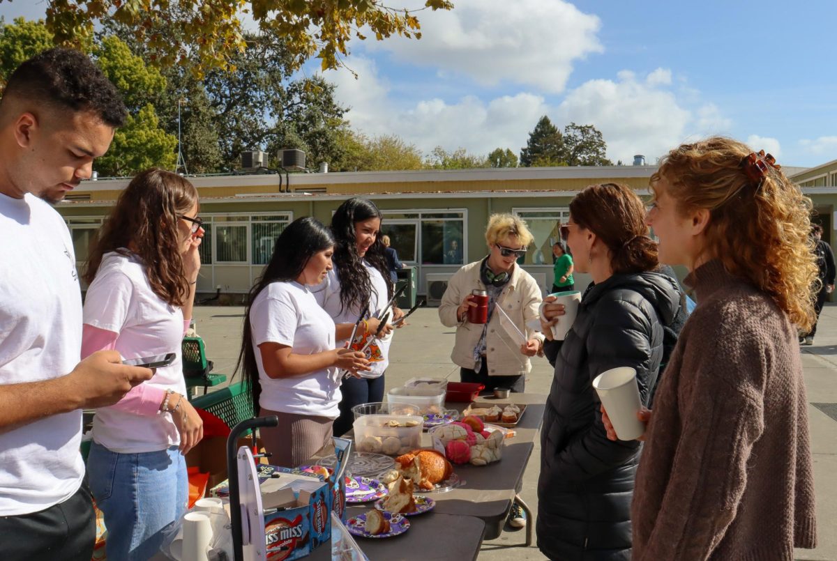 Archie Williams staff engage in Día de los Muertos trivia with STAAR students. 