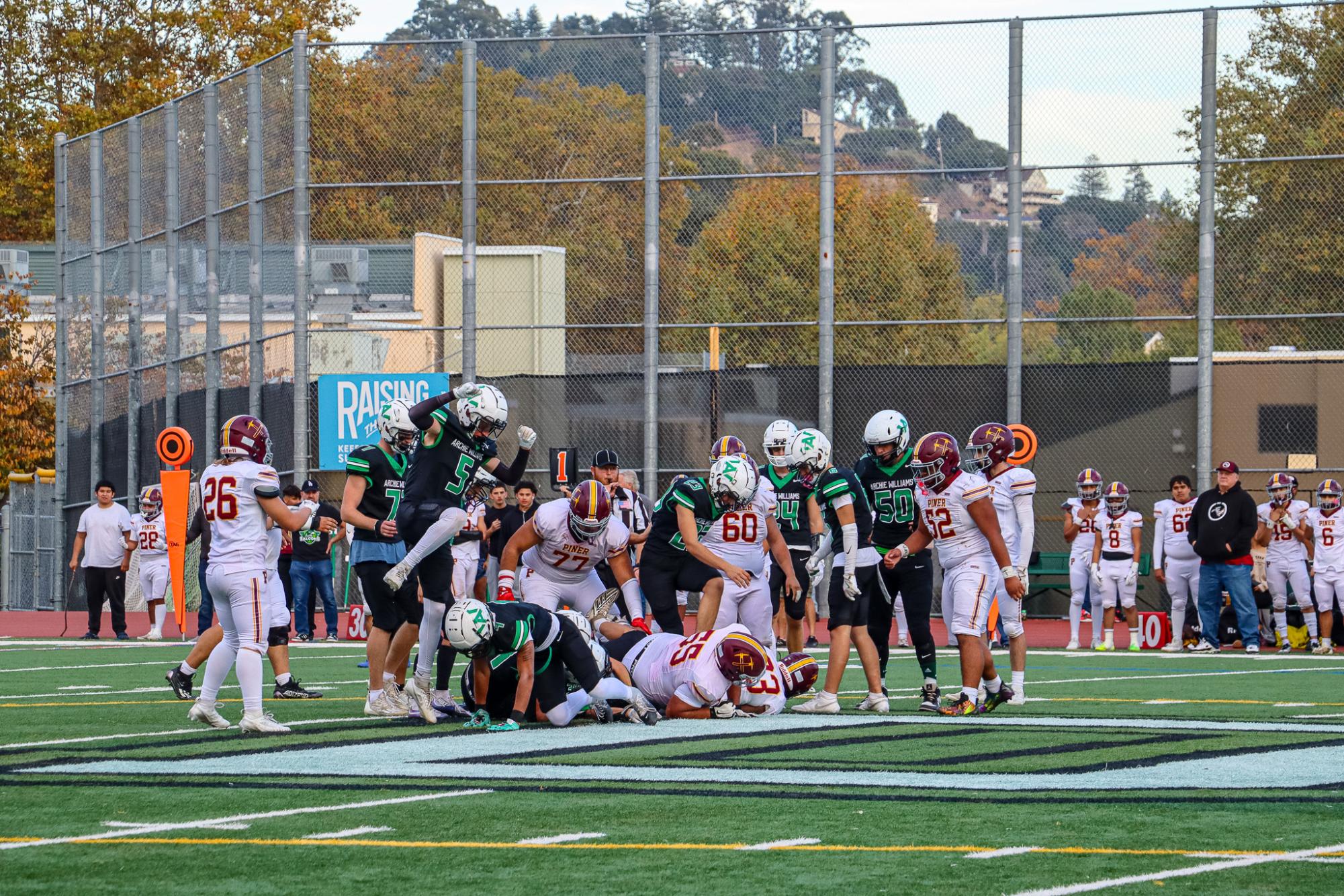 Archie Williams defense holds back the Piner Prospectors during the senior night football game.