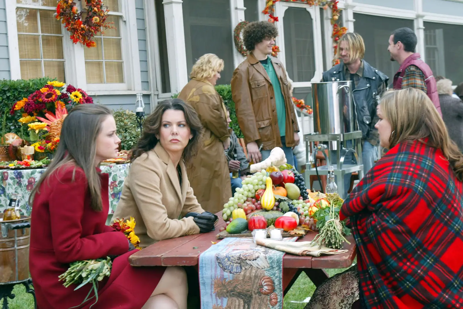 Lorelai (Lauren Graham) and Rory Gilmore (Alexis Bledel) enjoy their second Thanksgiving dinner at their friend Sookie’s house.
(Promotional Material courtesy of IMDB)