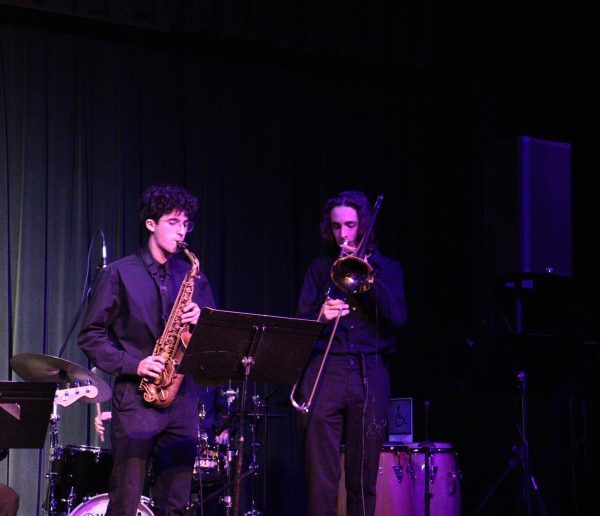 Senior Roy Quaas and junior Ryan Cunningham play the saxophone and the trombone in a cover of "Mr. Magic" by Ralph MacDonald. 