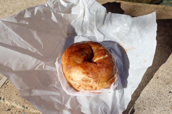 Warmed cinnamon and sugar bagel with butter from Bartons Bagels.