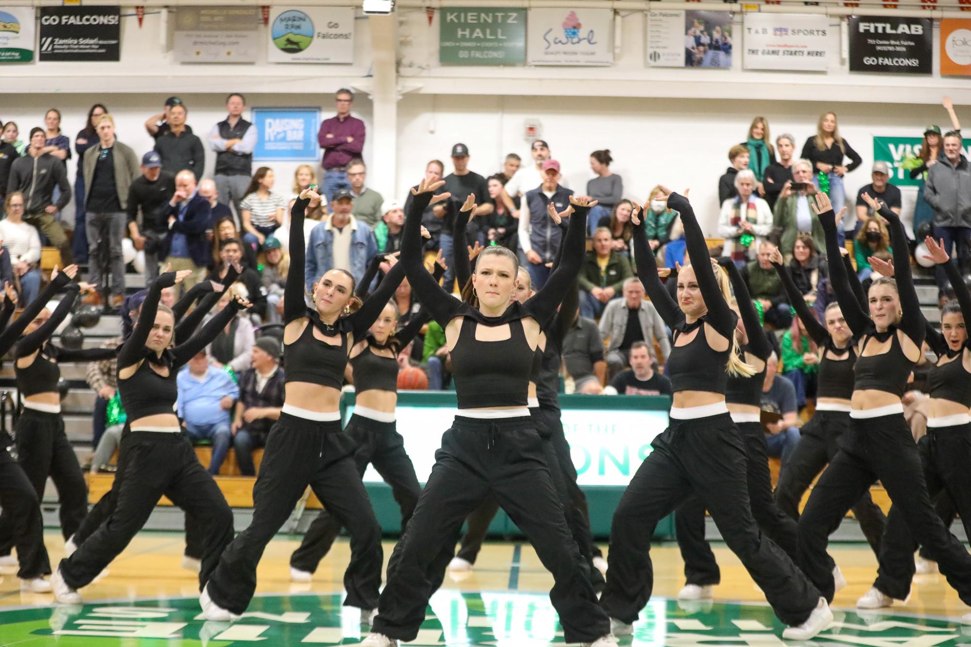 Dance Troupe performs during halftime of the boys varsity basketball Senior Night game. 