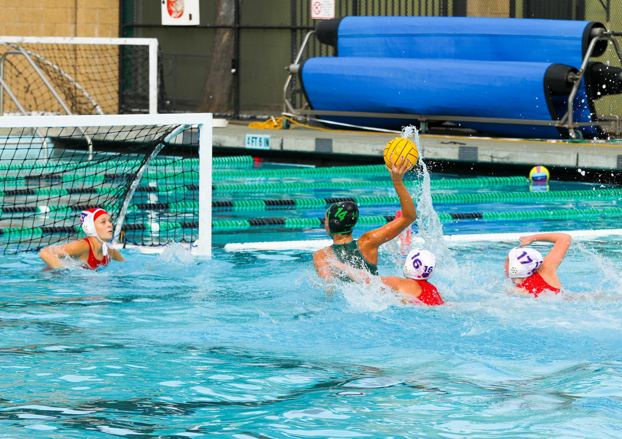 Archie Williams freshman Taylor Fahy rises to make a shot against Saint Ignatius goalkeeper during a varsity game. 