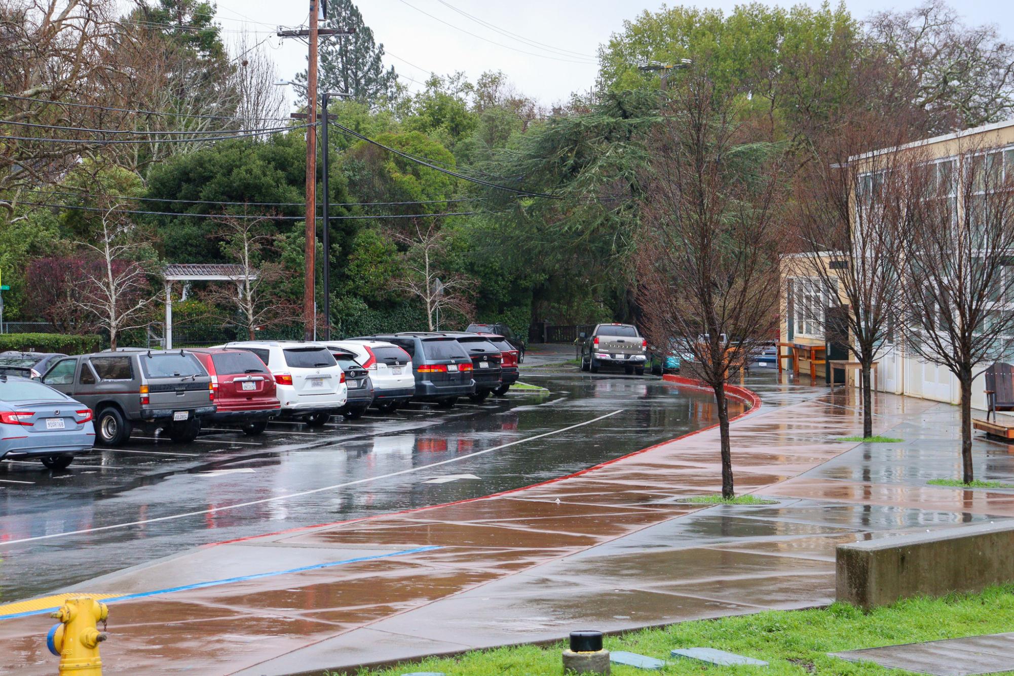 Rain soaks the Archie Williams parking lot on Saunders Ave.