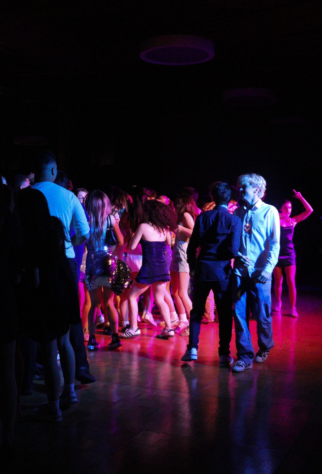 Archie Williams students form a mosh pit in the center of the dance floor. 