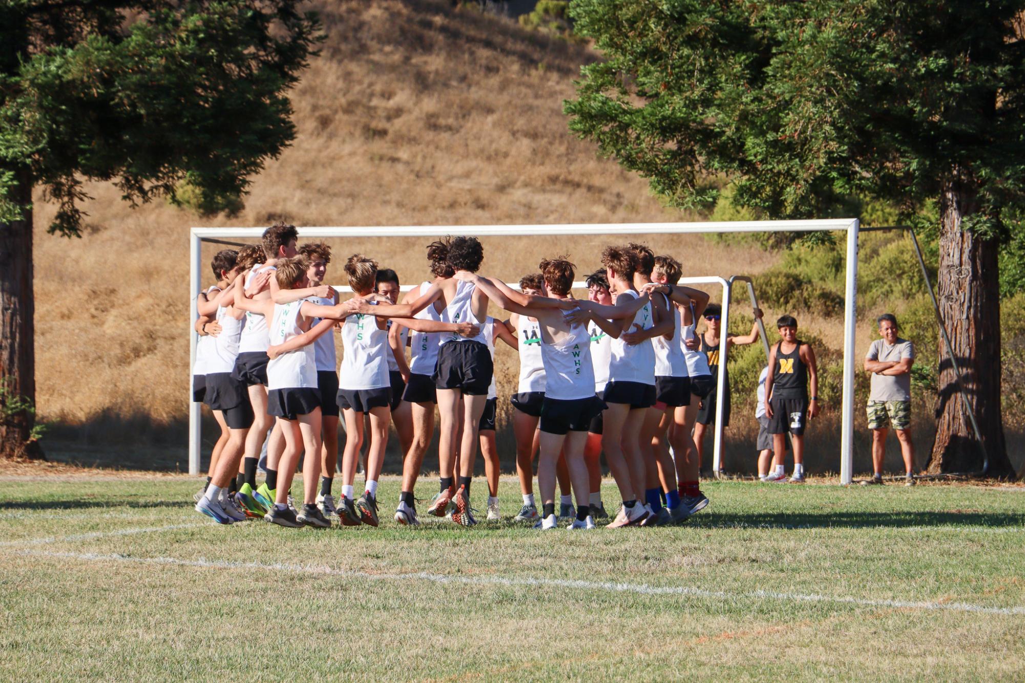 The Archie Williams team does a team cheer to prepare for the race. 