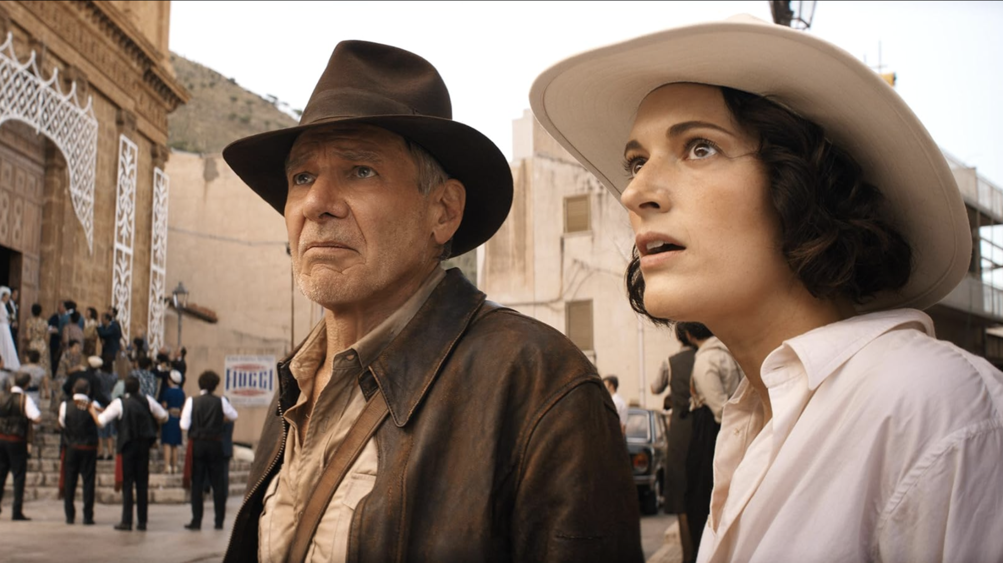 Indiana Jones (Harrison Ford) and his estranged goddaughter Helena Shaw (Phoebe Waller-Bridge) prepare to go on an adventure to find the Dial of Destiny. 
