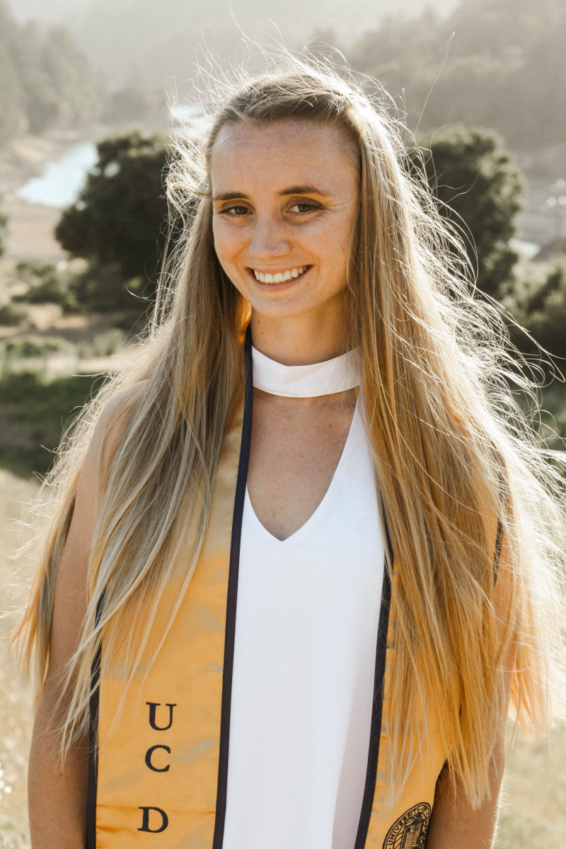 Venne's graduation photo from UC Davis from 2019 at Bon Tempe Lake. 
