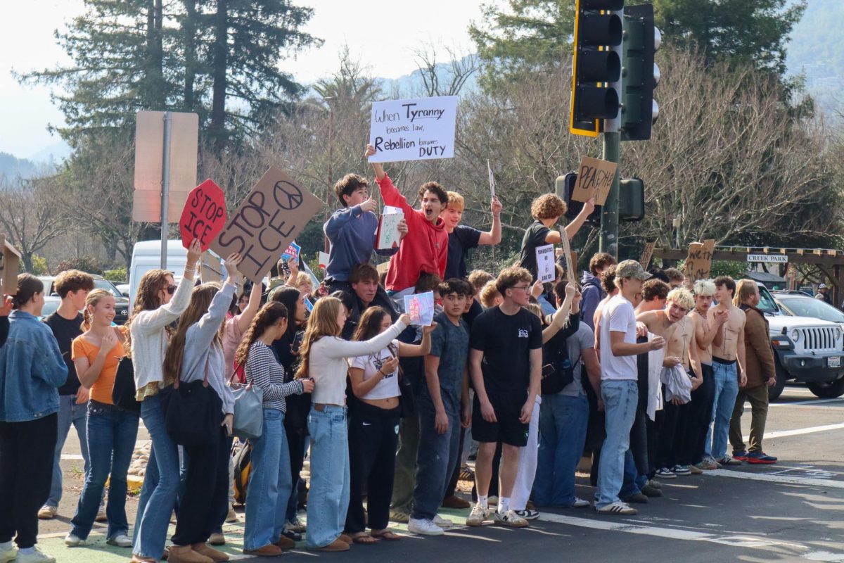 A group of students gather to express their opposition to ICE.