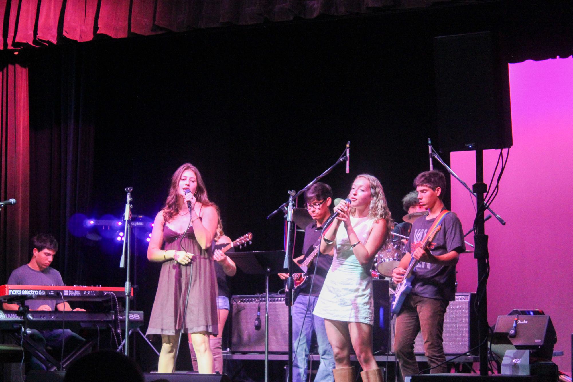 Senior Sadie Moors and Junior Petra Betti sing “Locked out of Heaven” By Bruno Mars.